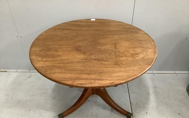 A Regency circular mahogany tilt top tea table, diameter 92c...