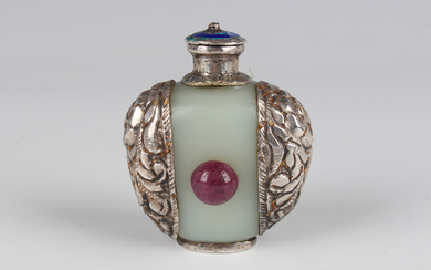 A Tibetan white metal mounted pale celadon jade snuff bottle, probably early 20th century, of flatte