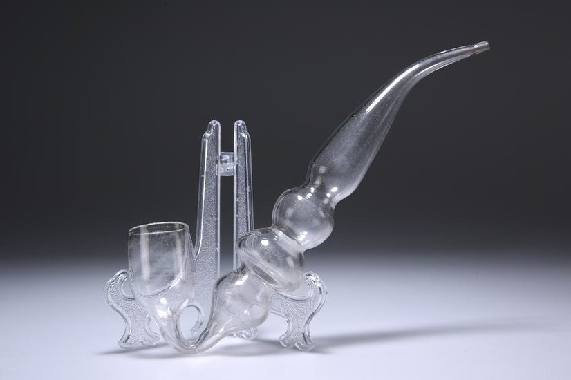 A VICTORIAN GLASS PIPE, with tapering and bulbous stem.