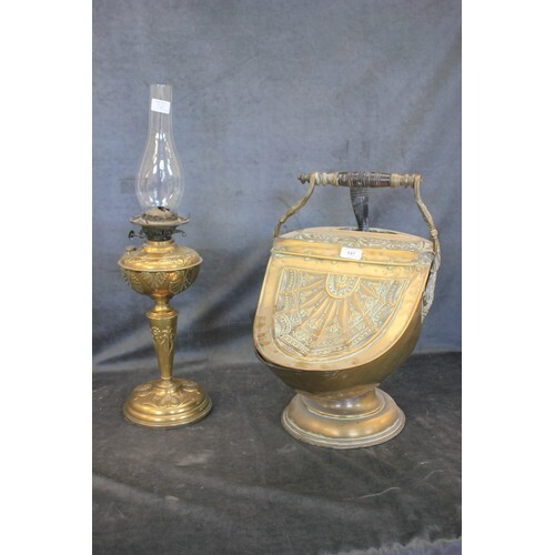 A Victorian cast brass scuttle with hinged lid on circular f...