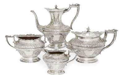 A Victorian four piece tea set, Sheffield, c.1897, James Dixon & Sons, comprising tea pot, coffee pot, sugar and milk jug, each designed with a pierced scroll and shell gallery and angular acanthus tipped handles, the oval bodies elaborately...