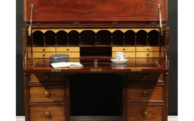 A Victorian mahogany secretaire kneehole desk, hinged top an...