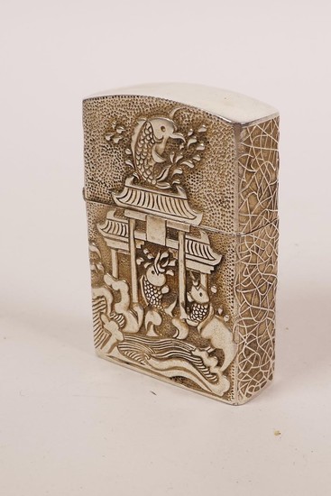 A Zorro lighter in a Chinese white metal case decorated with...