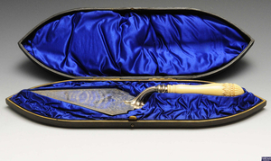 A cased Edwardian silver and ivory handled presentation trowel.