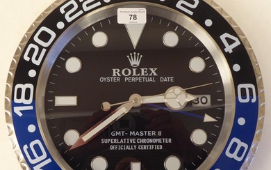 A dealer display, advertising wall timepiece for Rolex Oyste...