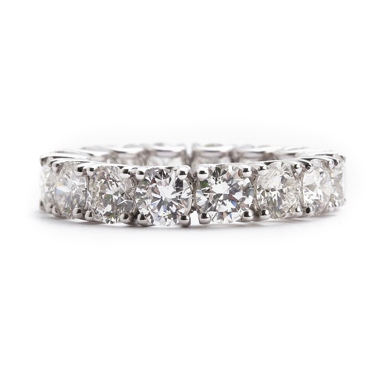 A diamond eternity ring set with numerous brilliant-cut diamonds weighing a total of app. 5.03 ct., mounted in 18k white gold. H-I/VS-SI. Size 52.