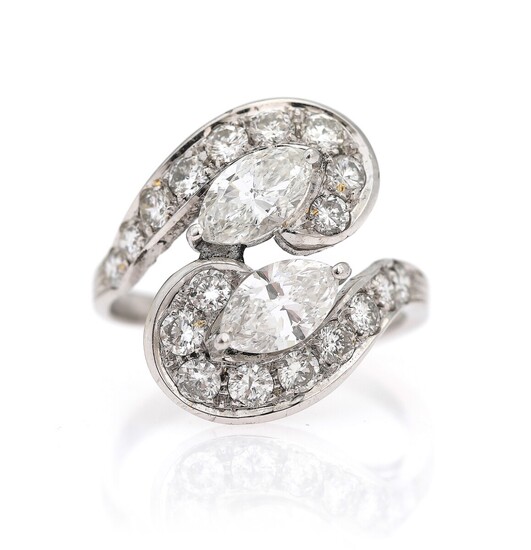 NOT SOLD. A diamond ring set with two marquise-cut diamonds weighing a total of app....