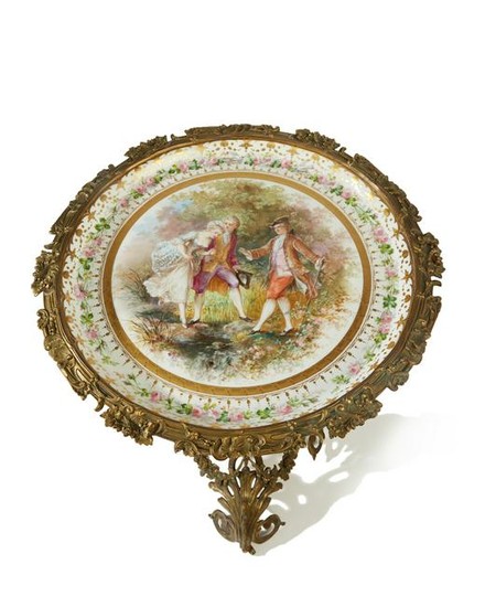 A gilt bronze-mounted Sevres porcelain side table