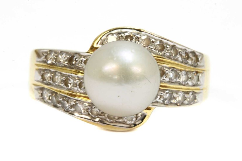 A gold cultured pearl and diamond ring