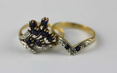 A gold diamond and sapphire ring