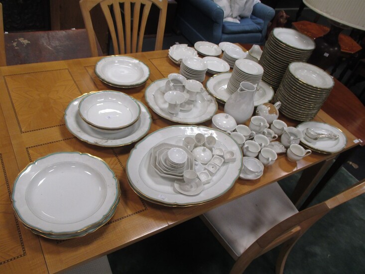 A large dinner service made in Berlin consisting of 58 Dinner plates, 11 Soup plates, 1 soup