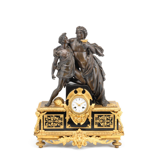 A late 19th century French, gilt and patinated bronze and black marble figural mantel clock