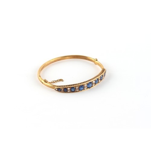 A late Victorian yellow gold (tests 15ct) sapphire & diamond...