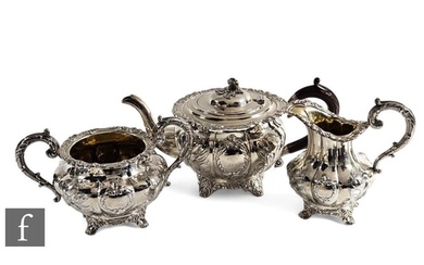 A matched hallmarked silver three piece melon shaped tea set...