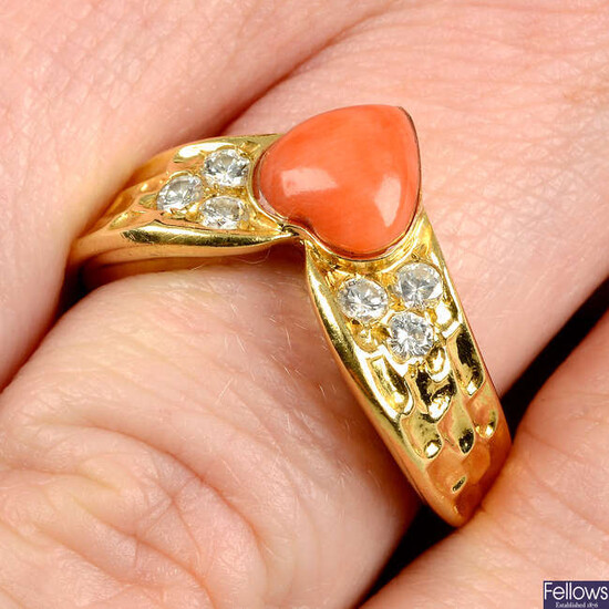 A mid 20th century 18ct gold coral heart and brilliant-cut diamond textured chevron ring, by Van Cleef & Arpels.