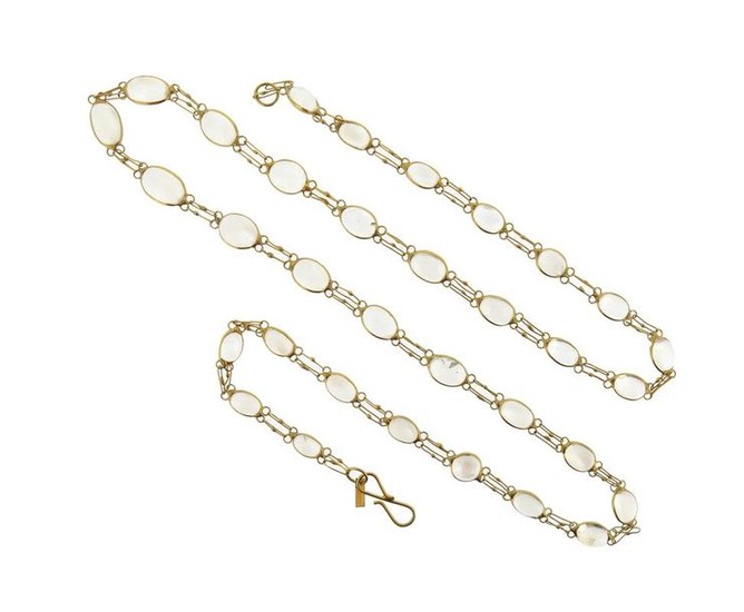 A moonstone-set gold long chain, set with cabochon...