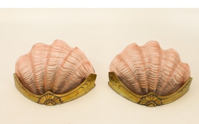 A pair of 1930s Art Deco brass and pink glass shell wall lig...