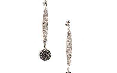 A pair of black and white diamond set ear pendants