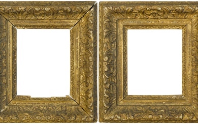 A pair of early 18th century British Louis XIV-style carved...