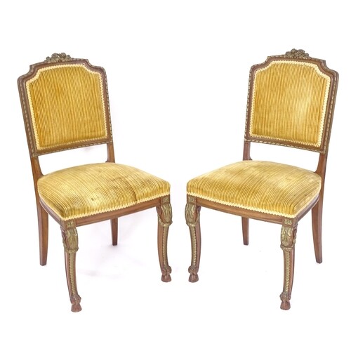 A pair of late 19th/early 20th century upholstered side chai...