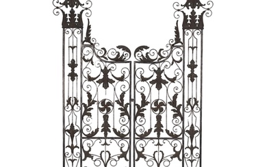 A patinated metal openwork twin fold screen, second half 20t...