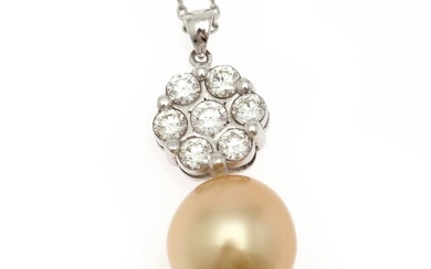 NOT SOLD. A pendant set with a cultured South Sea pearl flanked by seven diamonds,...