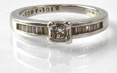 A platinum solitaire diamond ring with square cut central diamond,...