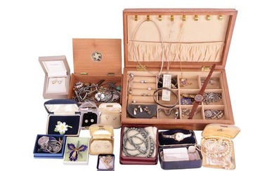 A quantity of costume jewellery and fashion watches, including a white metal and enamel brooch in th