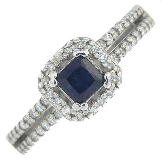 A sapphire and diamond cluster ring.Estimated total