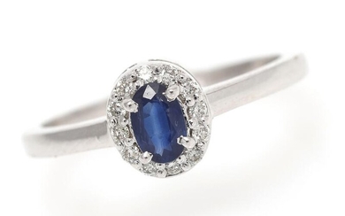 SOLD. A sapphire and diamond ring set with a sapphire encircled by numerous diamonds, mounted in 14k white gold. Size 51. – Bruun Rasmussen Auctioneers of Fine Art
