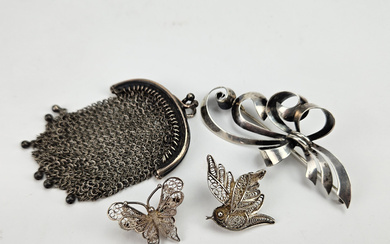 A set of 3 brooches and a coin purse. silver/likely silver.