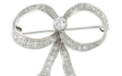A vari-cut diamond bow brooch.