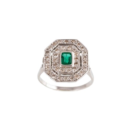 AN EMERALD AND DIAMOND CLUSTER RING, the octagonal cut emera...