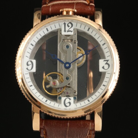 Akribos XXIV Skeleton Rose Gold Tone Wristwatch