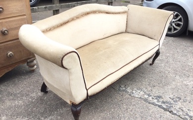 An Edwardian upholstered sofa with arched rolled back and rectangular...