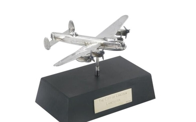 An Elizabeth II silver model of a Lancaster Bomber,...