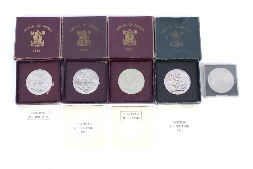 An assortment of British and world currency, boxed.