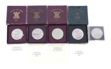 An assortment of British and world currency, boxed.