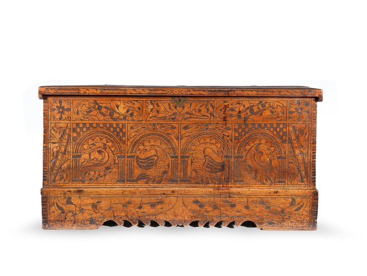 An early 17th century boarded cypress-wood and 'pitch'-decorated chest, North Italian