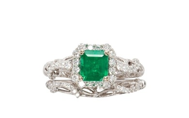 An emerald, diamond and 18k white gold engagement set