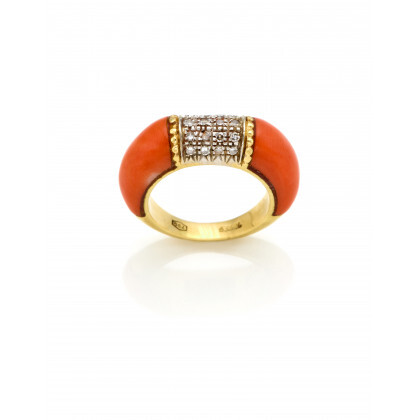 Bi-coloured gold, diamond and shaped orange coral ring, g 5.56 circa size 7/47. Marked 635AL. This lot may be subject...
