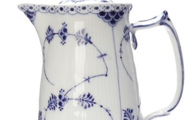 SOLD. “Blue Fluted Half Lace” porcelain jug decorated in blue. 510. The Royal Danish Porcelain Factory, 1894-1900. H. 23 cm. – Bruun Rasmussen Auctioneers of Fine Art