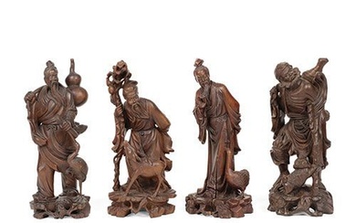 Ensemble de quatre figurines en bois sculpté de haute qualité, Chine. Plus grande hauteur :...