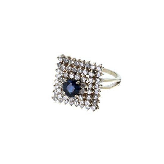 Gold ring with diamonds and sapphire