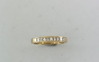 Half wedding band in gold 750°/°° decorated with...