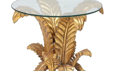 Hollywood Regency Style Gilt Leaf-form Side Table, 20th c., with flared leaf form supports, on a