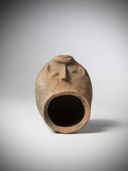 IGBO-IZZI, Nigeria. Terracotta medicine receptacle representing a face...