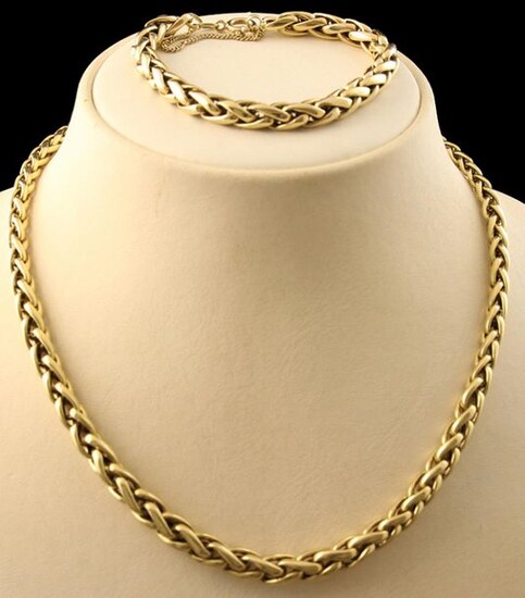 Jewellery gold - 14k yellow gold set consisting of a necklace and bracelet, both with a braided link - 18 and 47 cm
