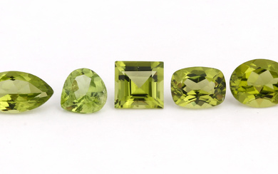 Lot 7 peridots-pairs , 14 peridots in different shapes and...