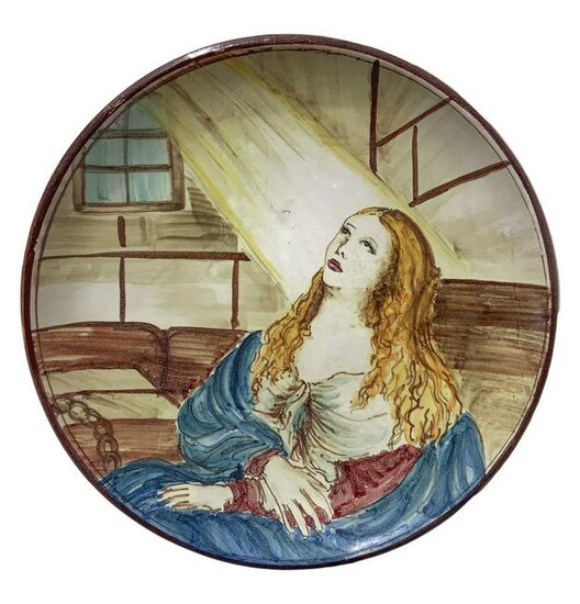 Majolica plate depicting St. Agatha in prison, hand